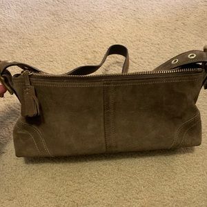 Coach small suede taupe purse.